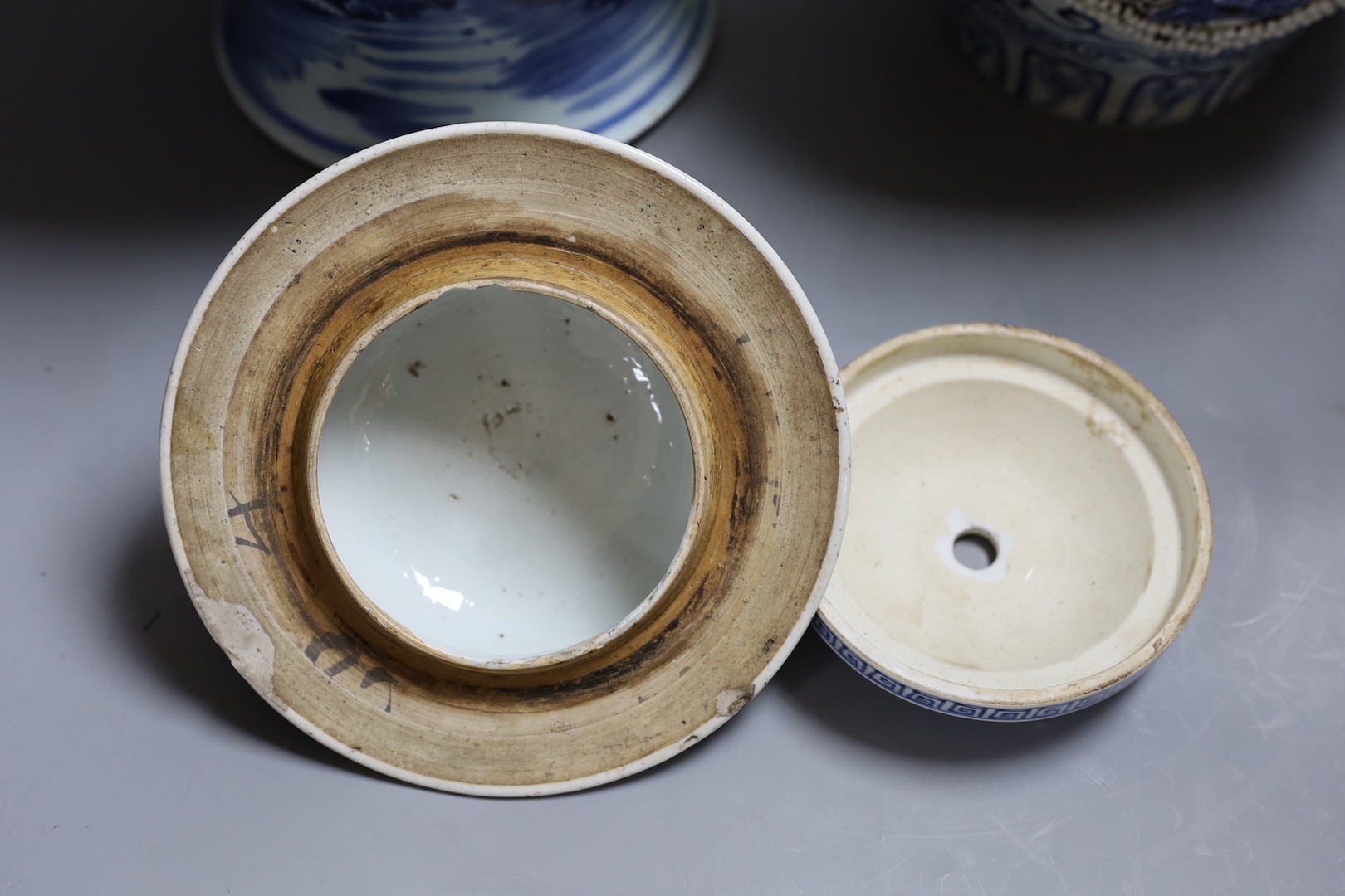 A large Chinese blue and white jar and cover and a blue and white jar and cover, 19th-century and later. Largest 44cm